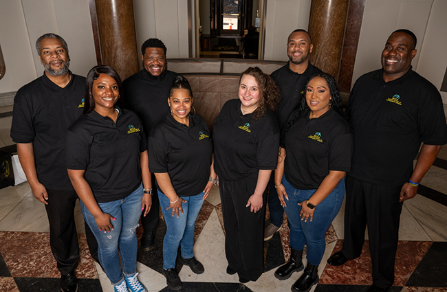 Photo of MOCA staff.  Left to right: Musaa Abdurrahman, Ashelle Henry, Rashad Singletary, Lia Lynch, Rebecca Mark, Glen Middleton Jr, Tierra Tuggle and Tommy Phillips